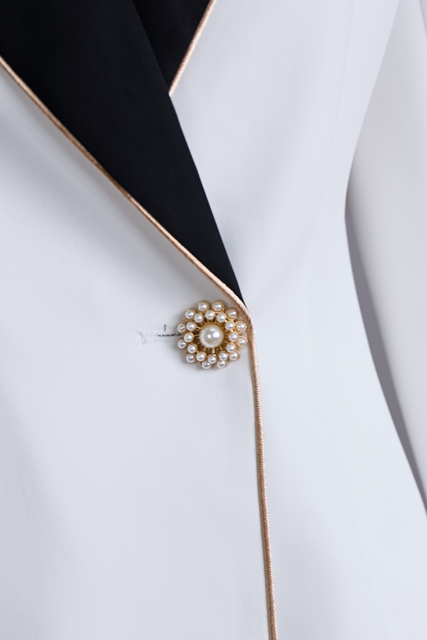 Elegant White Black Contrast Lapel Blazer by Merchant Mona 