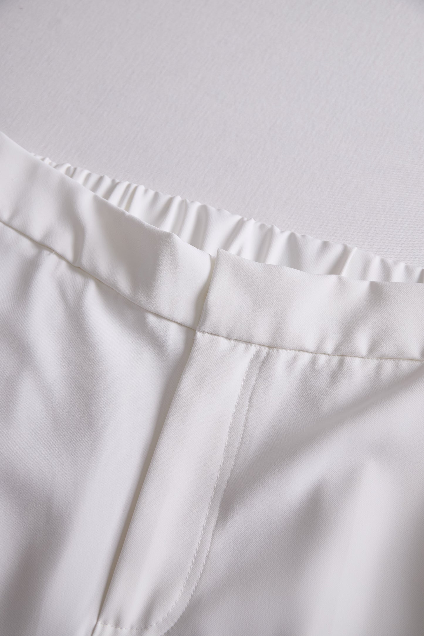 White High Waist Wide Leg Flare Pants by Merchant Mona 
