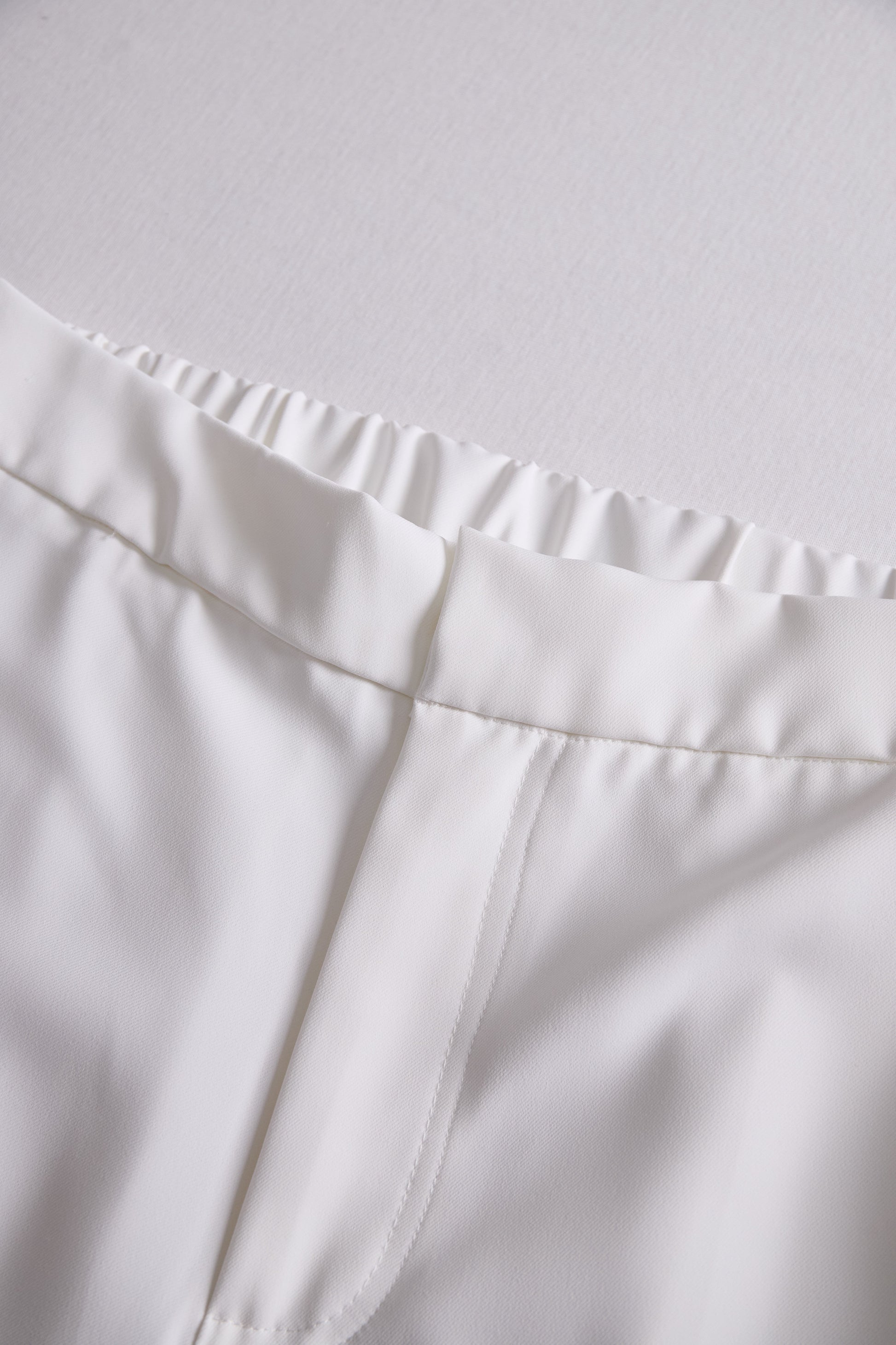 White High Waist Wide Leg Flare Pants by Merchant Mona 
