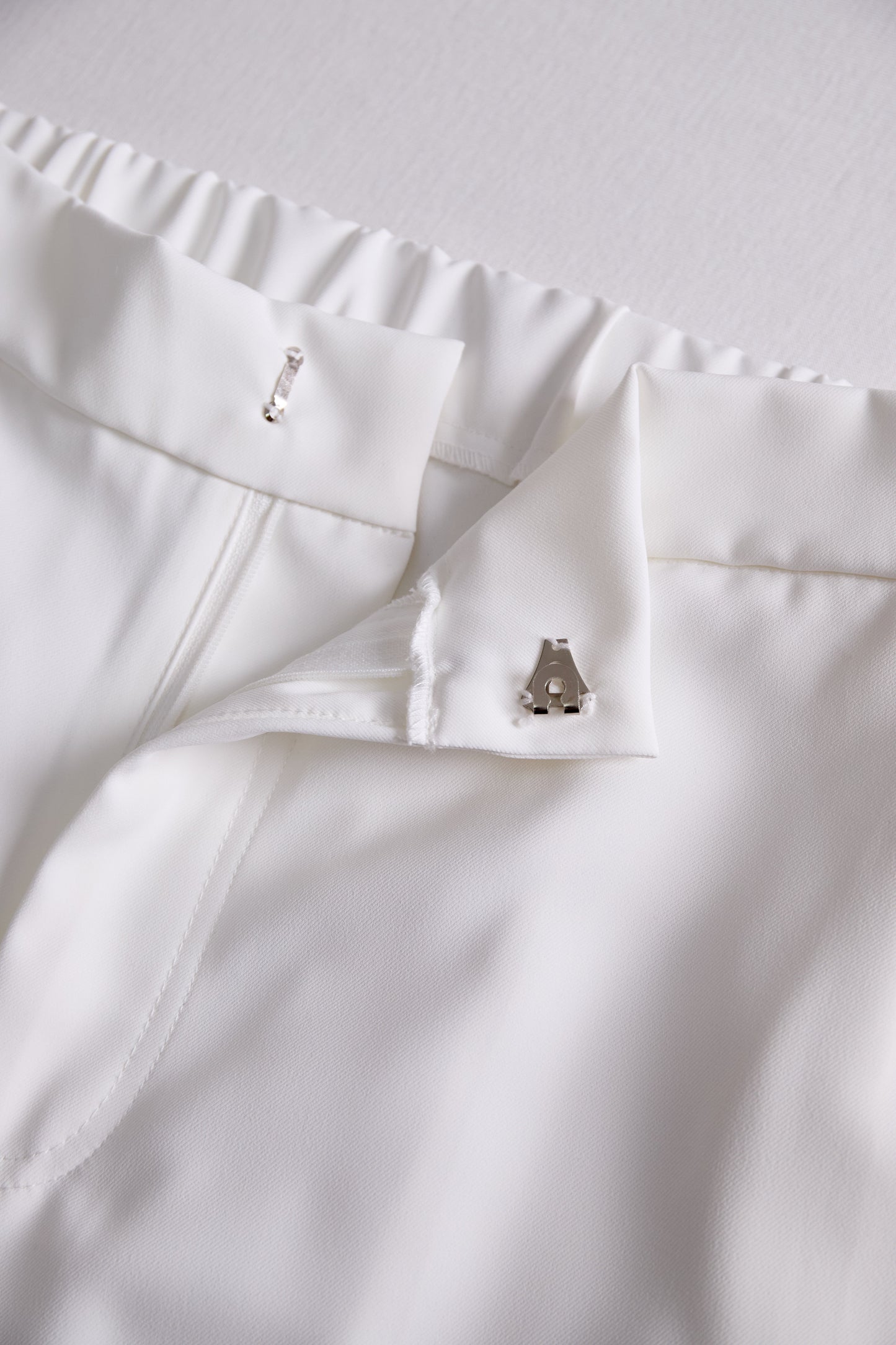 White High Waist Wide Leg Flare Pants by Merchant Mona 